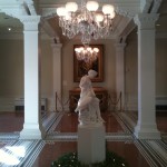Sculpture and mosaic tile floor in lobby of Lightner Museum, Alcazar Hotel