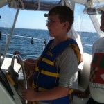 Caleb learning to sail